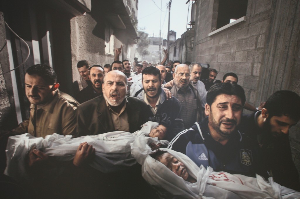 World Press Photo of the Year by Paul Hansen (Sweden). Gaza City after the Israeli attacks.