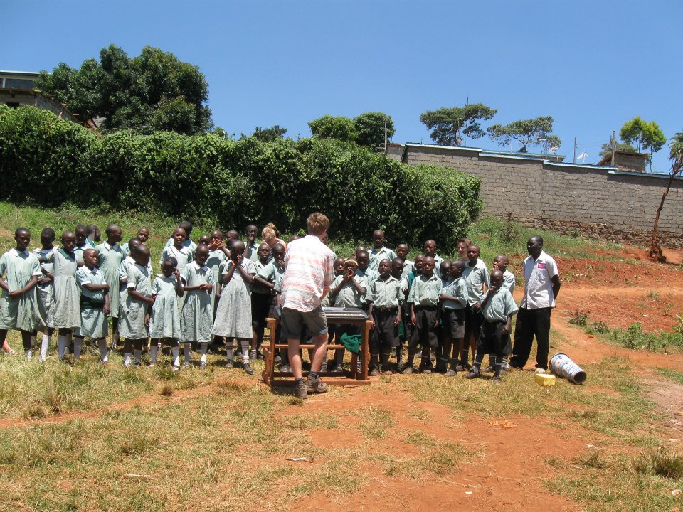 Bard College Berlin BA student Lucas Cone from Denmark teaching music during his self-planned project in a school in Kenya