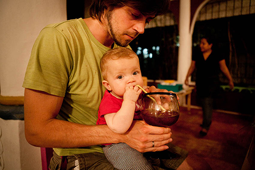 Mila likes Jamaica drink at the Cancun - Restaurant Pozoleria. Mexico (Yucatan). Photo: “Family Without Borders” blog